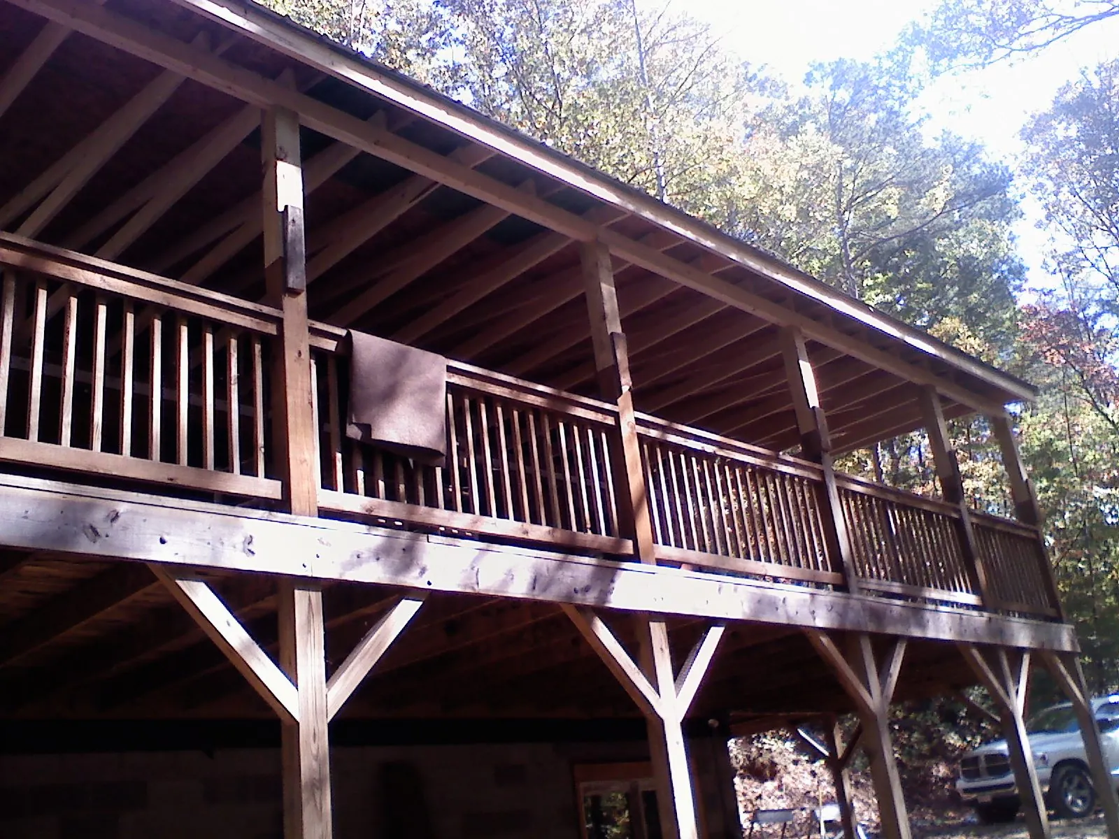 Timber framing under a new elevated porch and deck — Roof Leak Repair in New Smyrna Beach by Roofing Brothers
